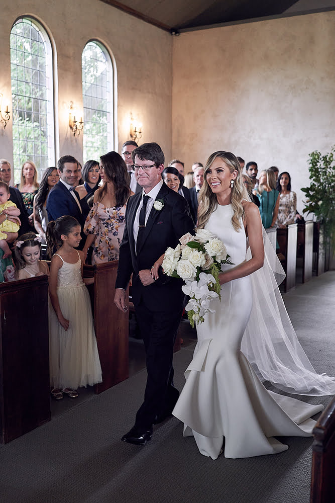 Wedding Planning - Bride and her father walking down the aisle