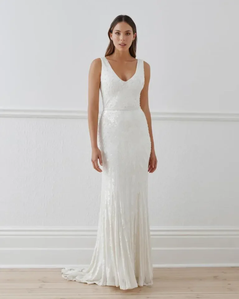 a bride in a sheath style wedding dress