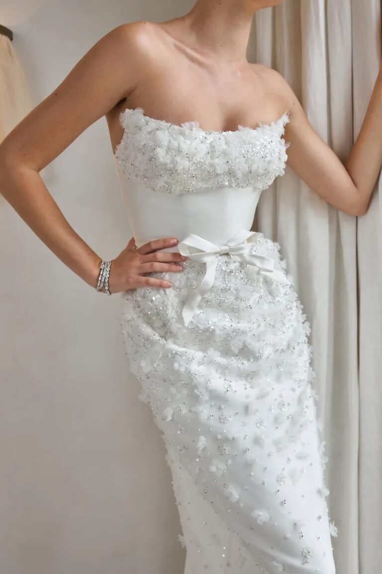 A close up of the Steven Khalil column wedding dress