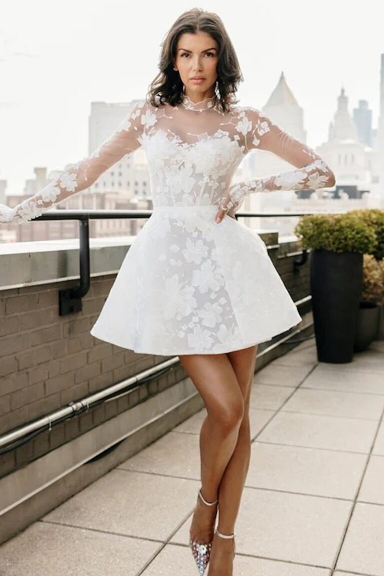 A bride wearing a short flared wedding dress that's perfect for a petite bride