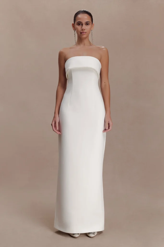 A strapless fitted wedding dress by Meshki that's under $500
