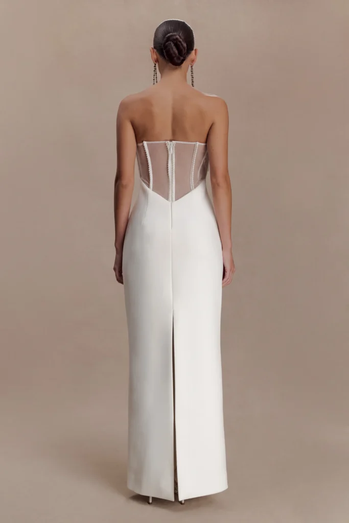 the pearl back of an affordable wedding dress by meshki