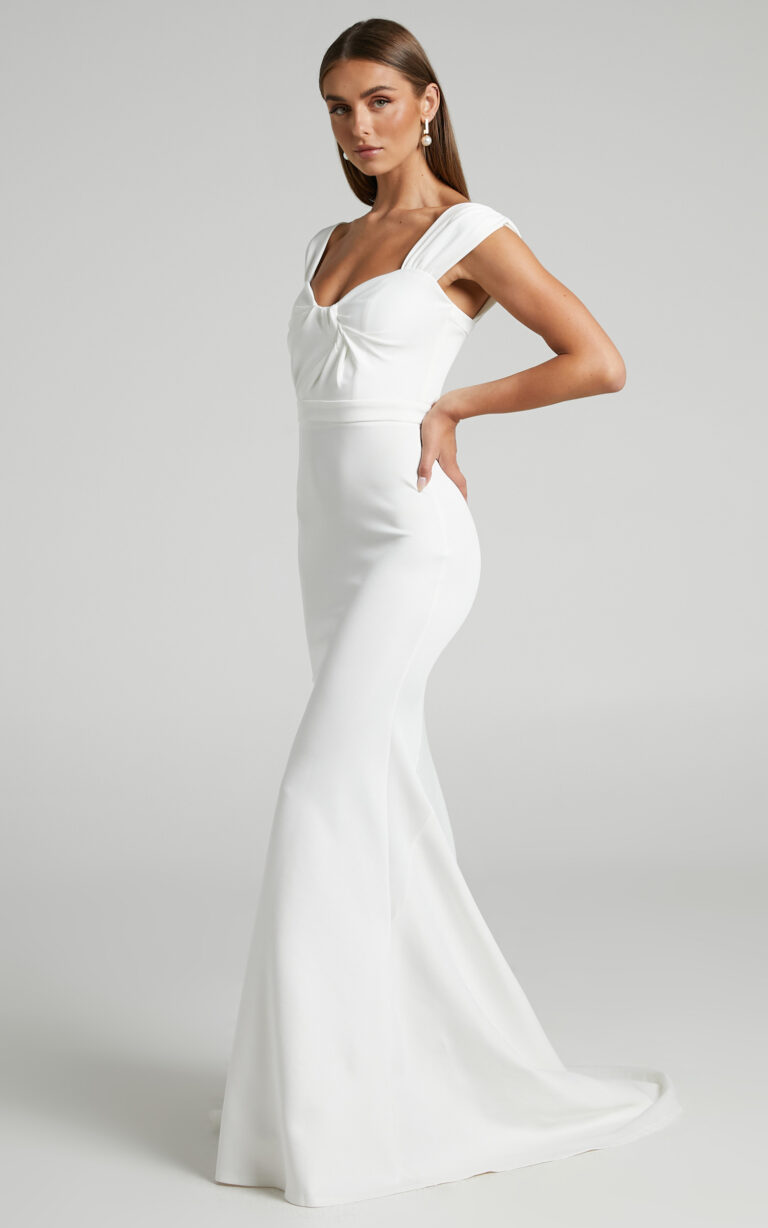 Modern bride wearing a timeless white gown from the best wedding dresses under $500