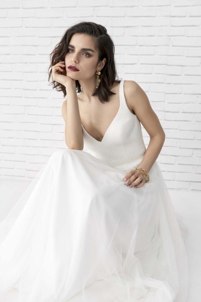 a bride in the rembo styling wedding dress