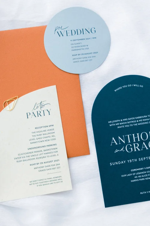 a collection of colourful wedding stationery by an Australian wedding invitation designer