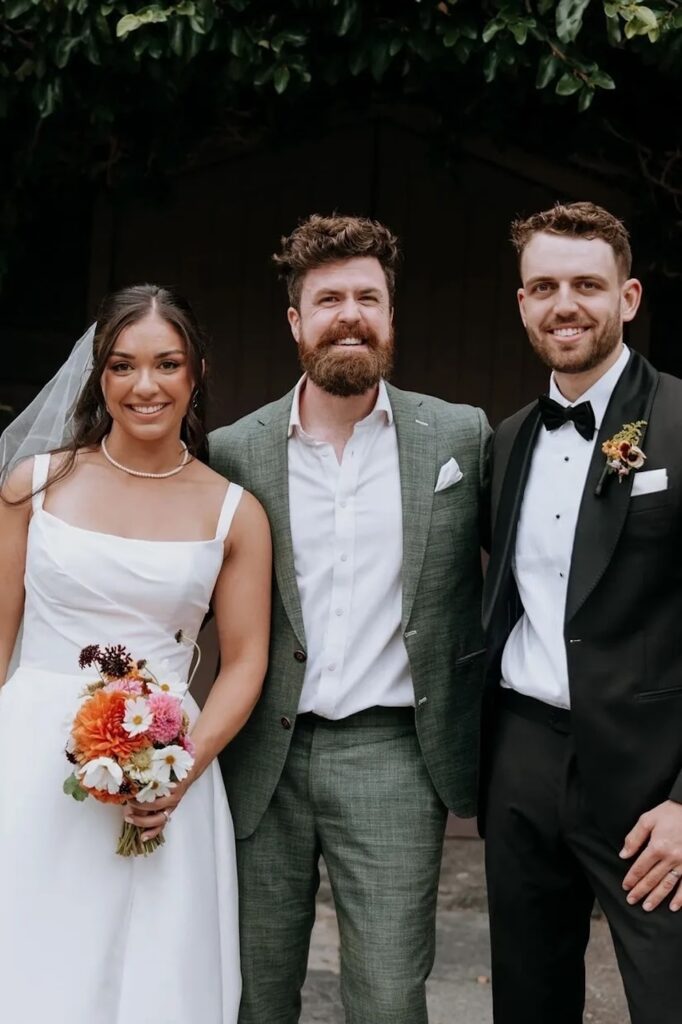 Melbourne marriage celebrant weddings by the beard standing between a bride and groom