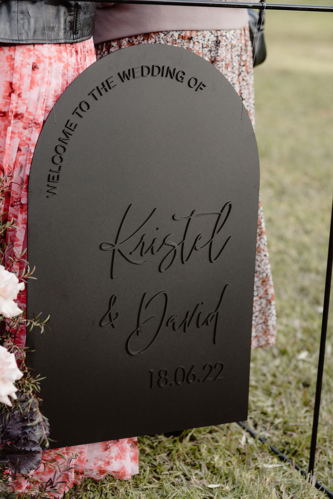 Wedding sign: Welcome to the wedding of Kristel and David.