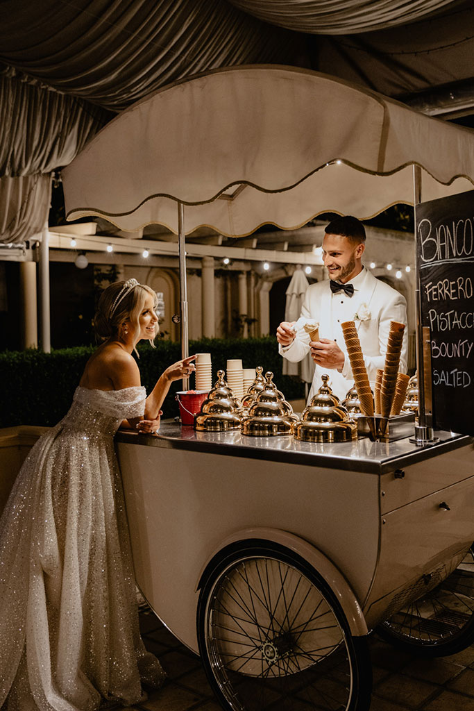 Couple at an ice cream cart.