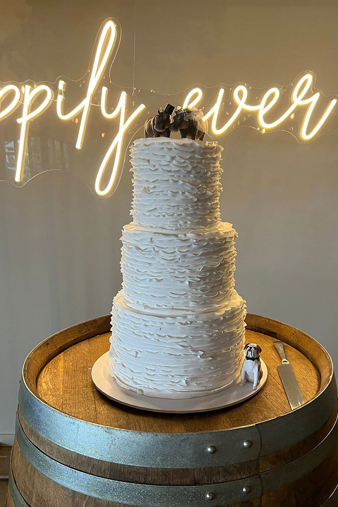 A three tier wedding cake.