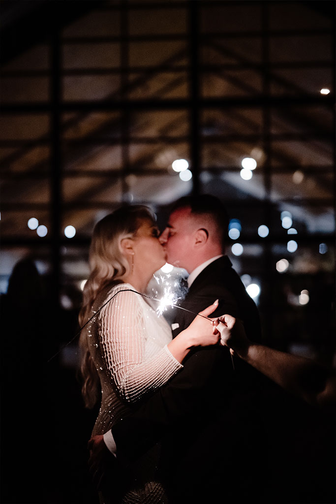 A couple kissing.