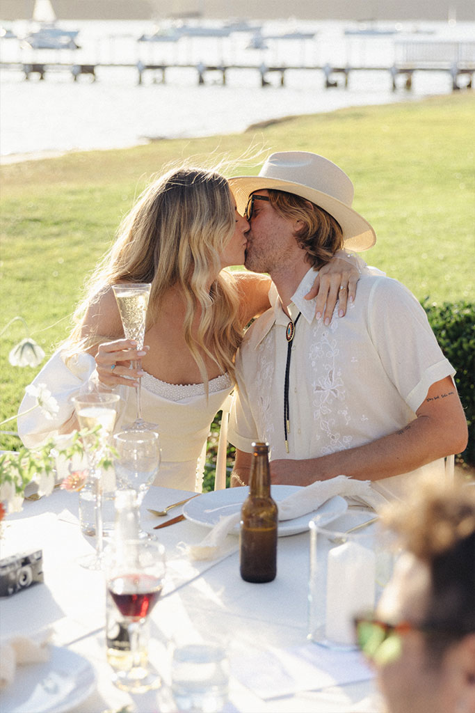 The couple kissing.