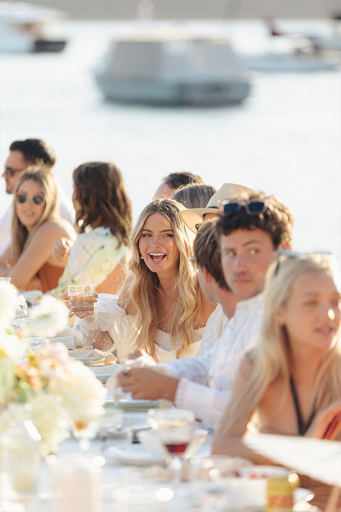Wedding guests enjoying themselves at the reception.