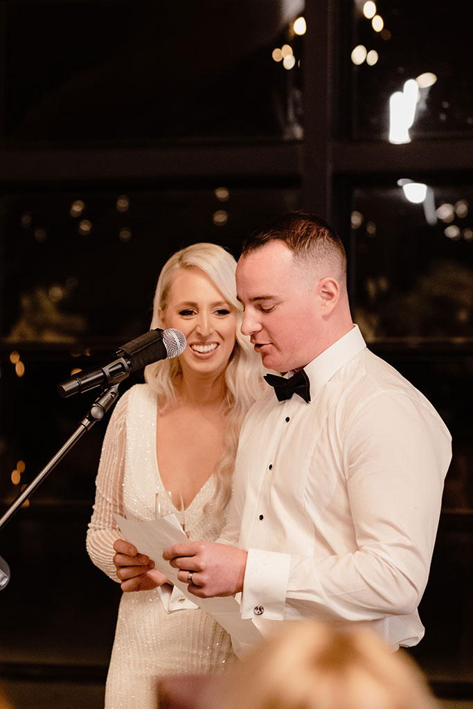 A man speaking on a mic.