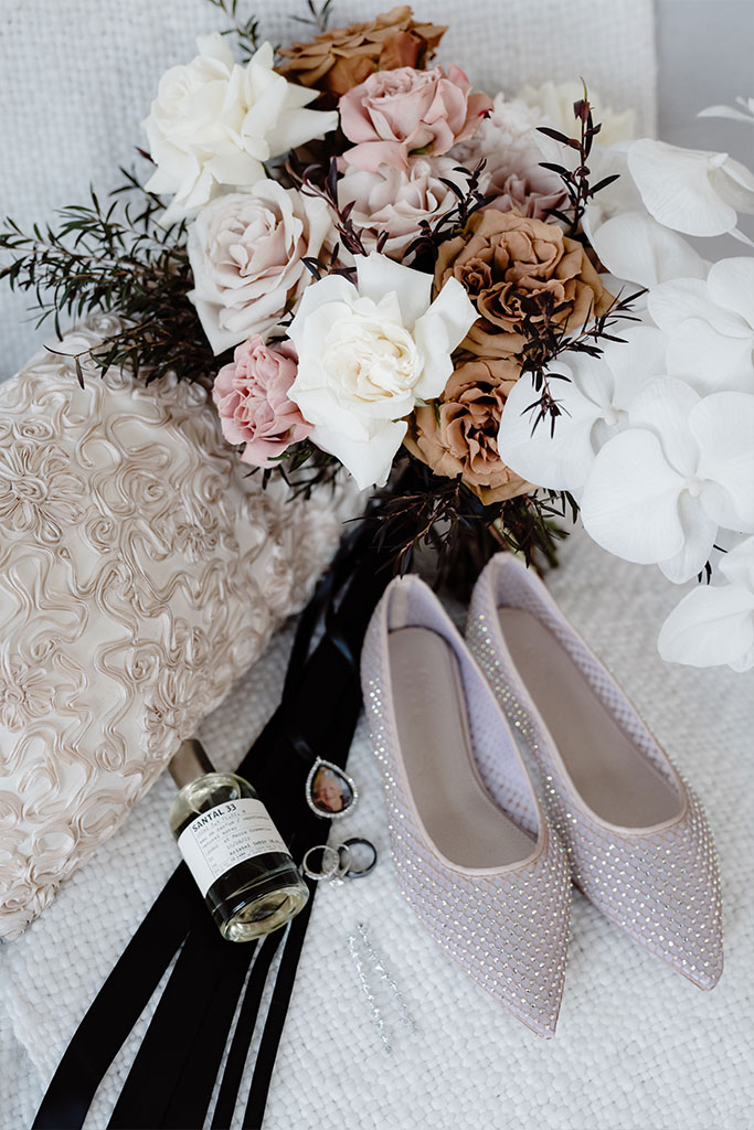 Wedding shoes, bouquet, and accessories.
