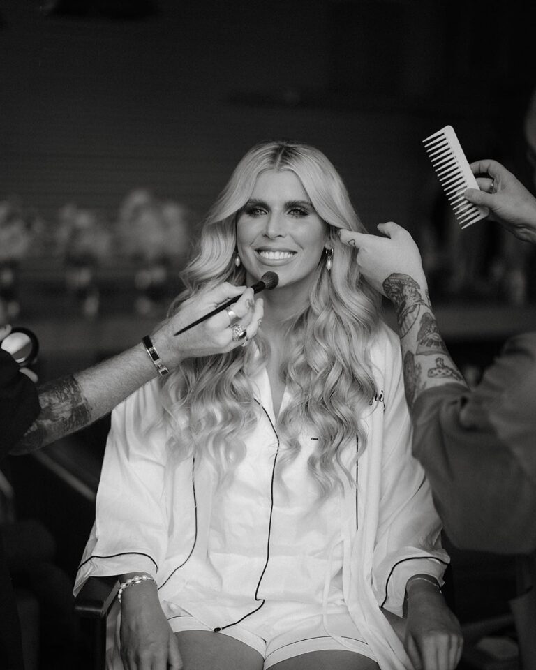 The bride getting her makeup done.