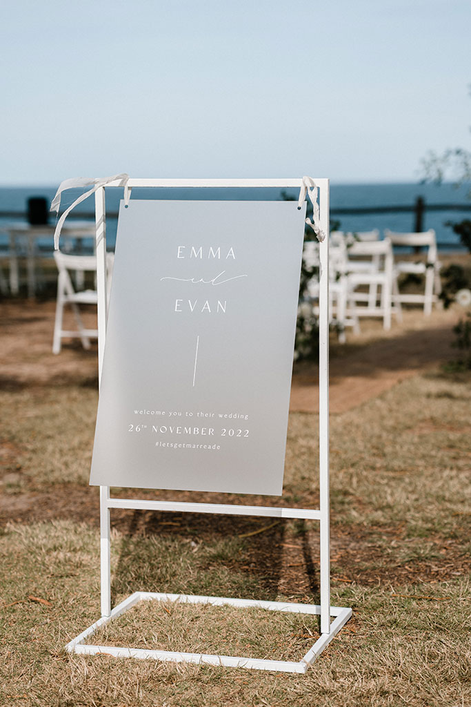 The couples name on a sign.