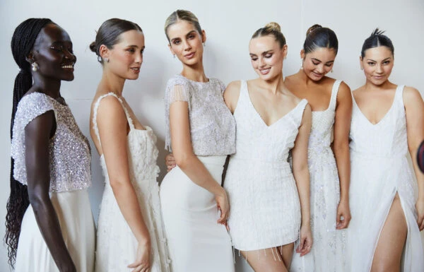 Women wearing wedding dresses.