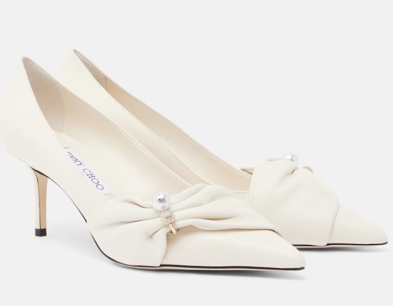 a pair of jimmy choo wedding shoes in white leather