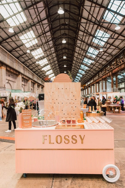 A stall with champagne called "Flossy"