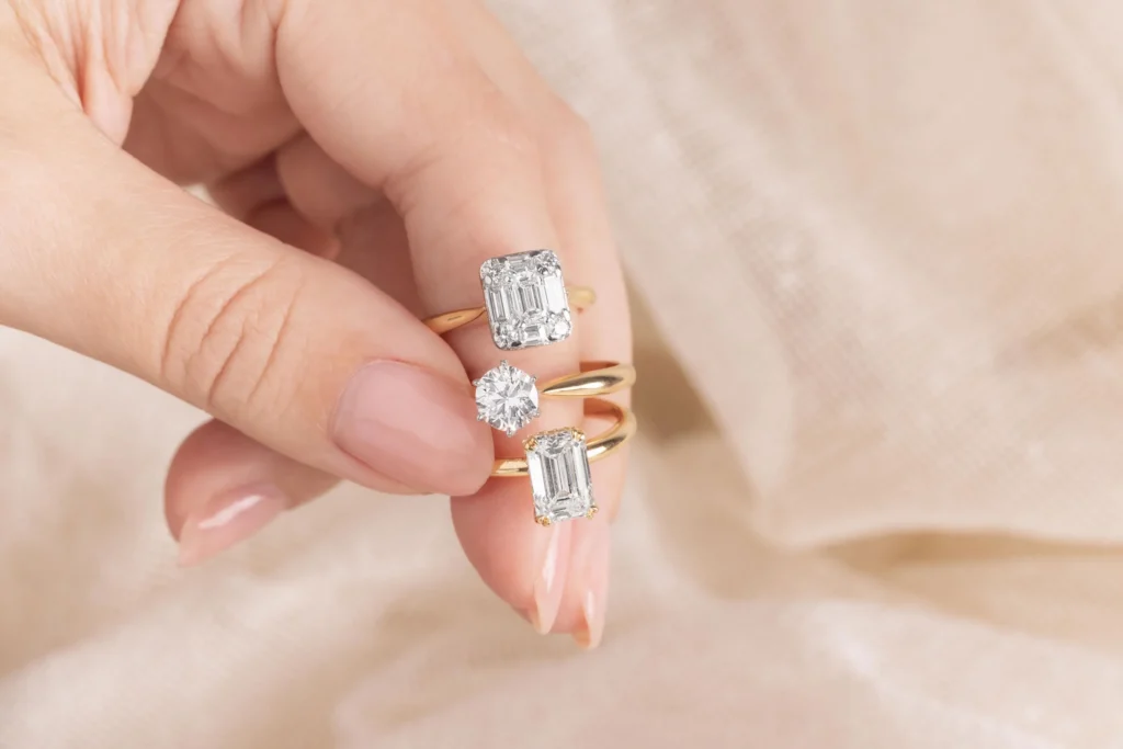 A woman's hand featuring a diamond engagement ring from Charles Rose Jewellers Melbourne