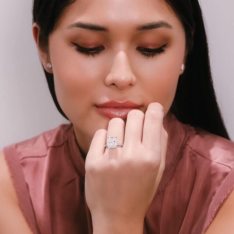 A bride wearing a solitaire diamond engagement ring in Sydney