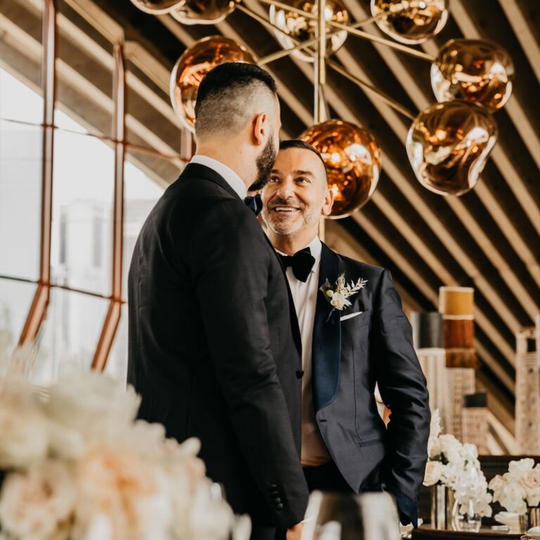 A couple smiling at each other in sydney city wedding venue bennelong