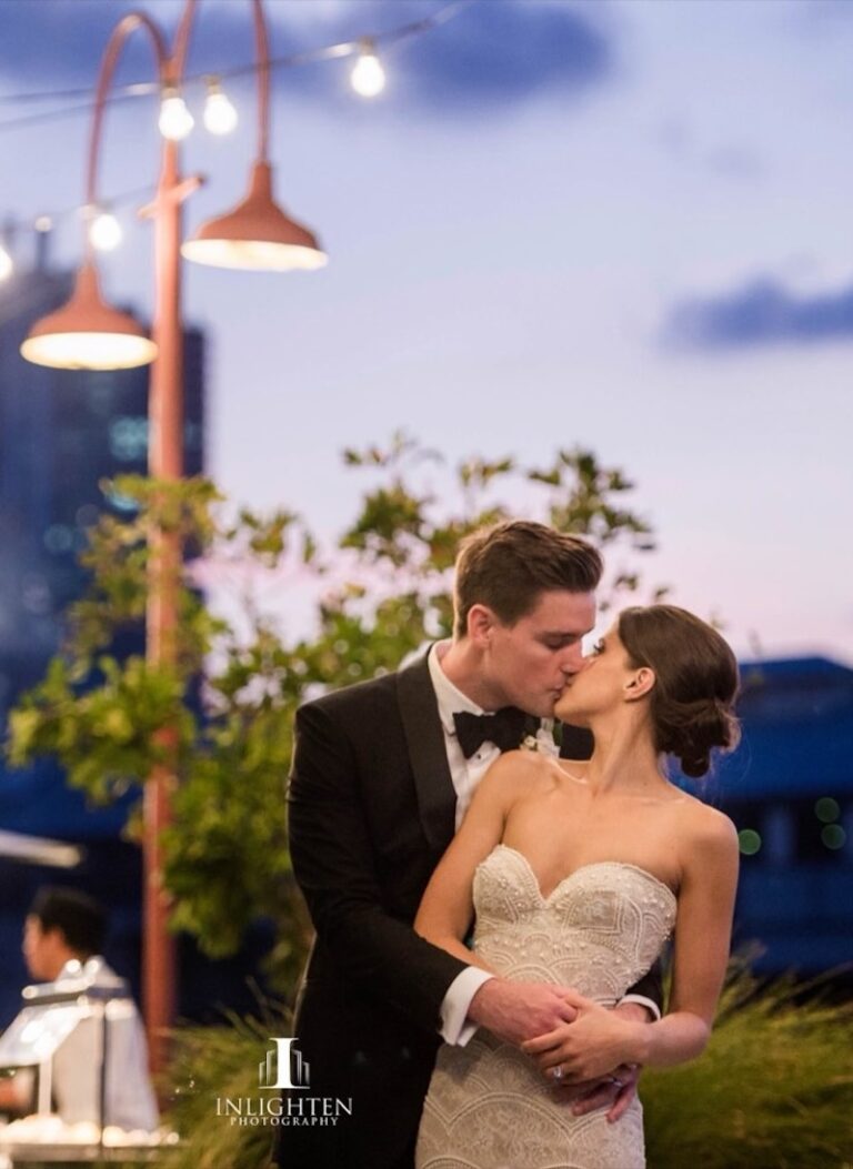 A couple kissing at Pier One Sydney wedding venue