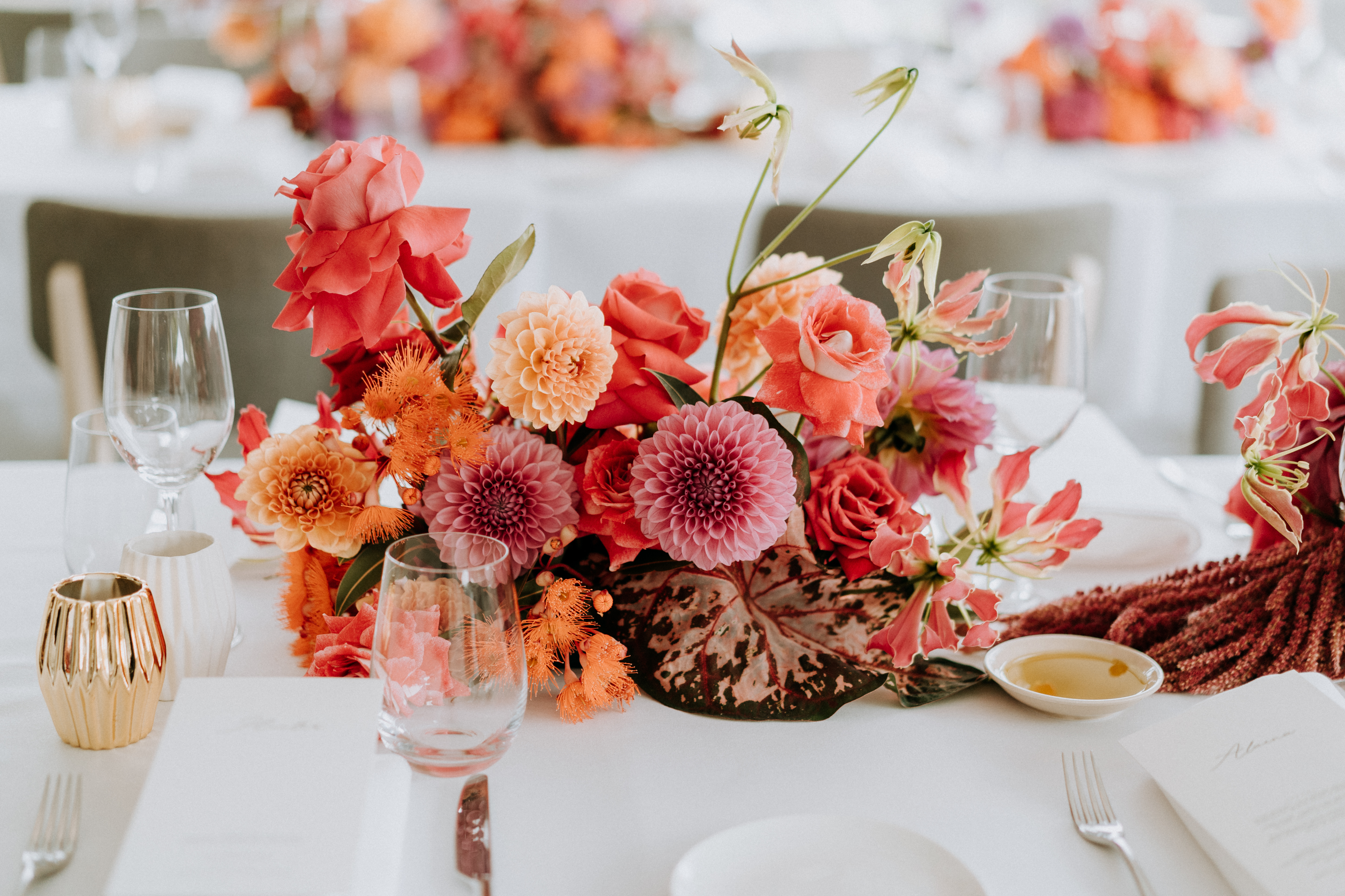 Beautiful red themed floral arrangement by White House Flowers