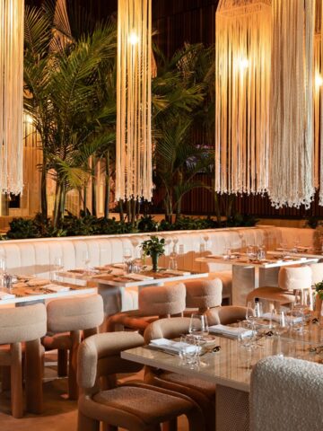 Elegant wedding reception setup with white tablecloths and chairs by Dann Event Hire, best wedding event hire Melbourne.