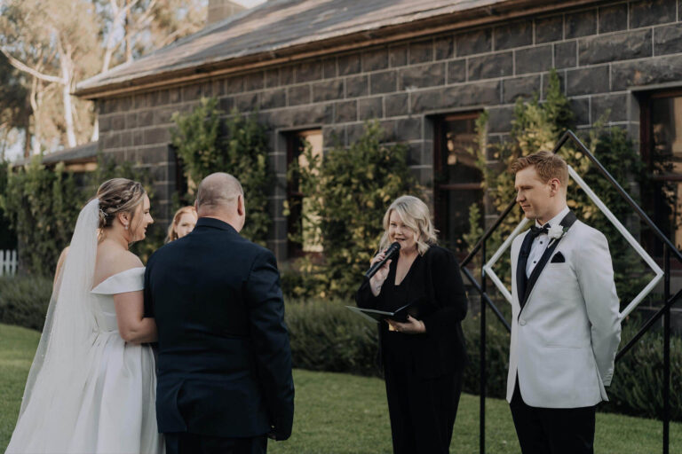 Couple exchanging vows with Leeann Cook Wedding Celebrant in Melbourne officiating.