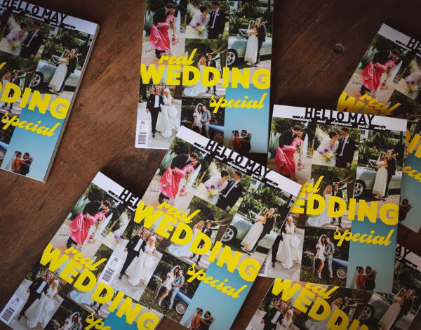 Wedding Services Listing Category Hello May Flat lay of Hello May magazine showcasing Australian bridal fashion and wedding inspiration