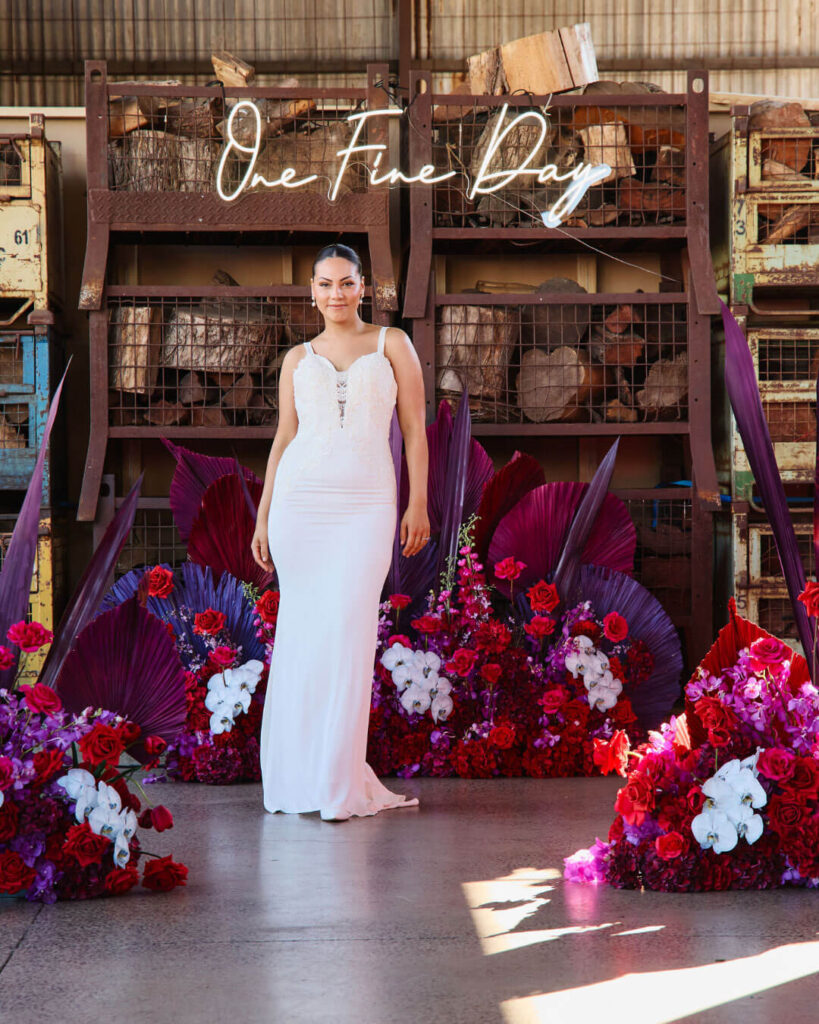 Strappy fitted wedding gown with modern minimalist design showcased during a bridal runway show in Melbourne.