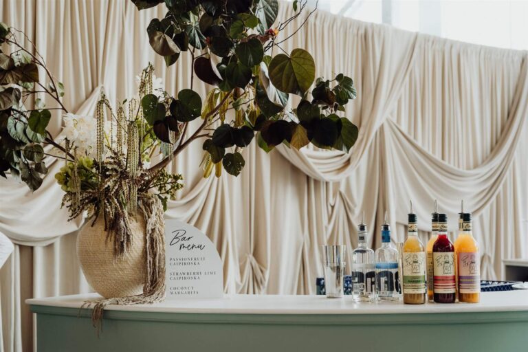 Bar setup featuring assorted bottles of drinks at the wedding expo in Sydney 2025