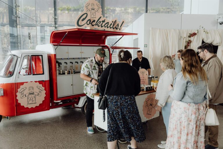 Crowd gathered at cocktail booth during wedding expo in Sydney 2025