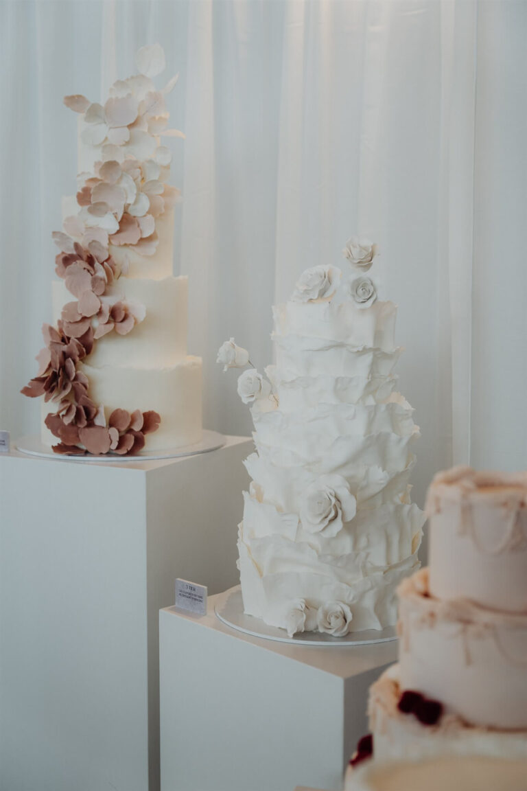 Wedding expo in Sydney 2025 featuring three cakes with different layers and tiers