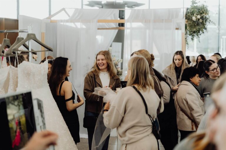Crowd laughing and enjoying themselves at wedding expo in Sydney 2025