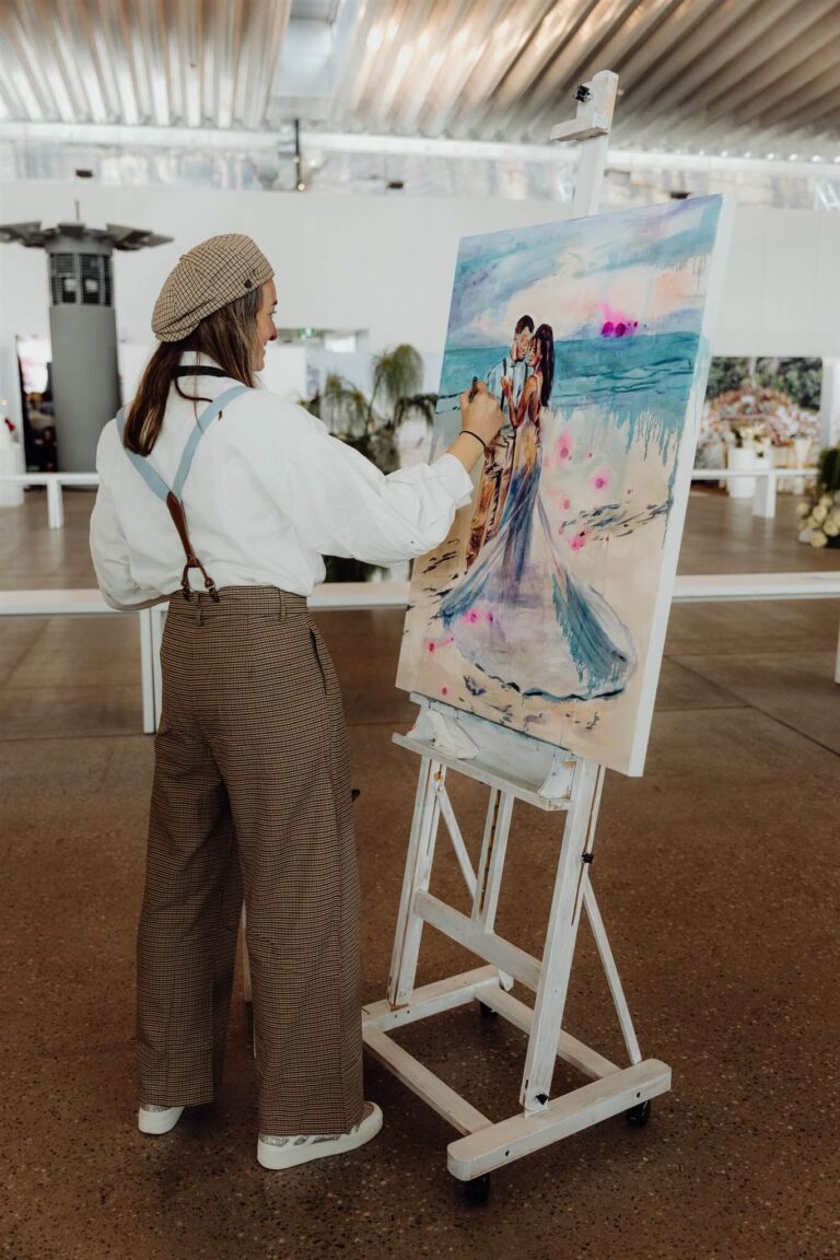 Painter creating live illustration at wedding expo in Sydney 2025