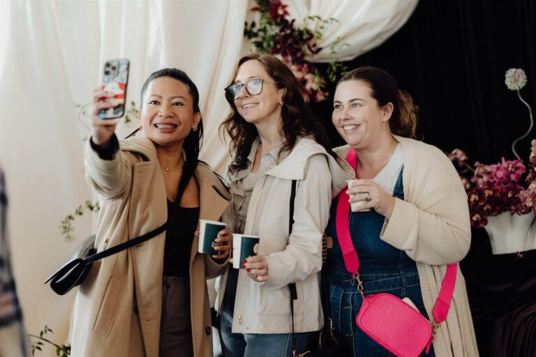 Group of visitors taking selfie at wedding expo in Sydney 2025