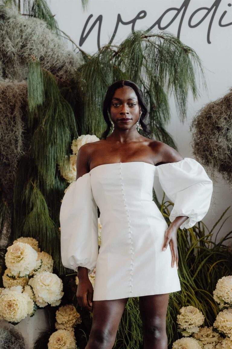 Close-up of model wearing tube-like bubble sleeve dress at wedding expo in Sydney 2025