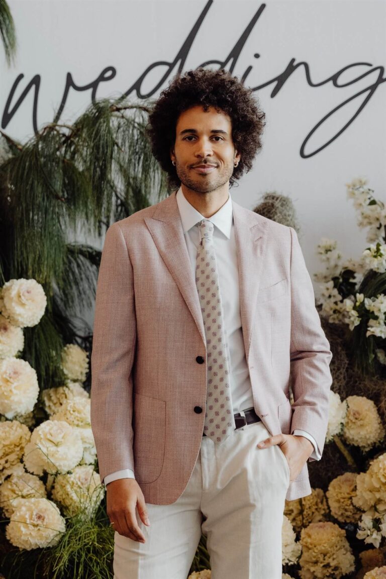 Elegant light beige suit paired with cream pants worn by model at the wedding expo in Sydney 2025