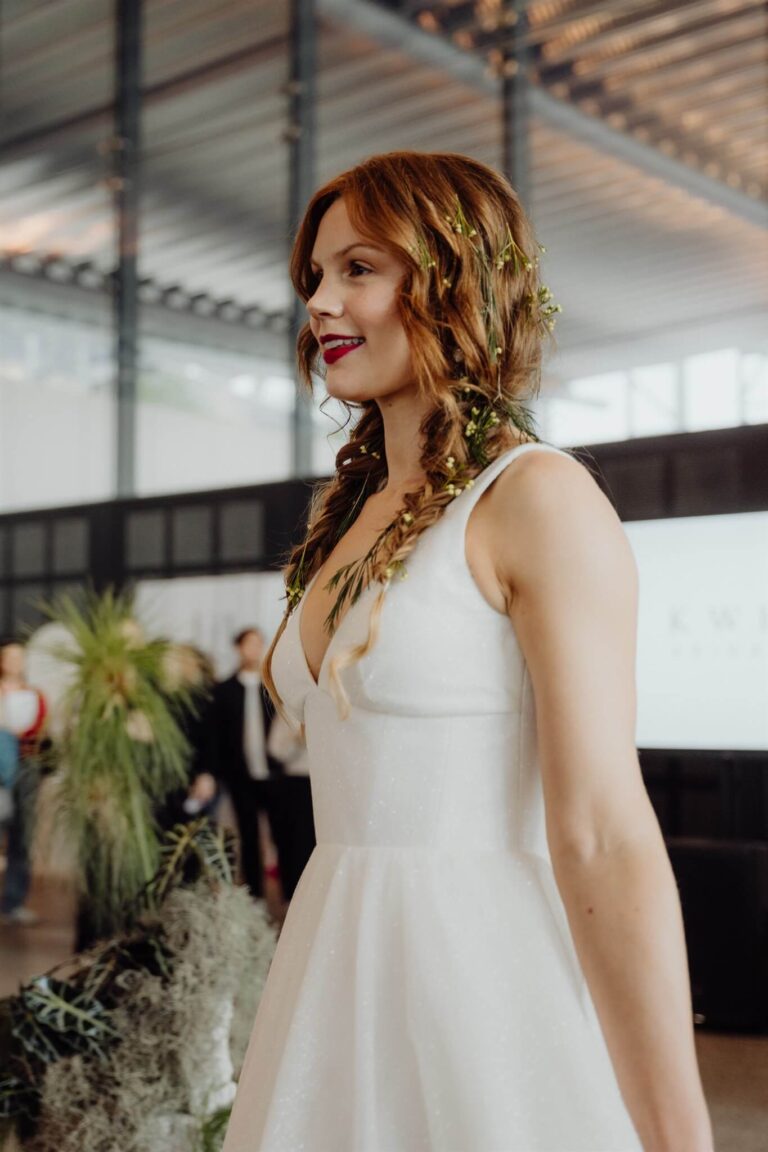 Close-up of model wearing bridal runway gown at wedding expo in Sydney 2025