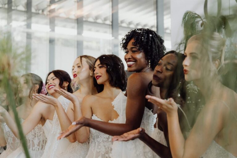 Side view of happy bridal runway show models at wedding expo in Sydney 2025