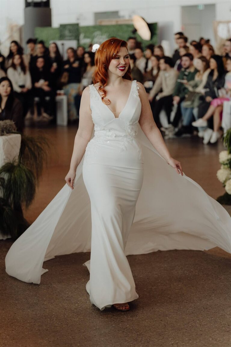 Wedding expo in Sydney 2025 featuring model showcasing designer gown up close