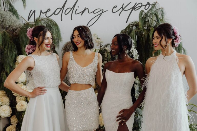 Group of five happy bridal models sharing a laugh at wedding expo Sydney 2025