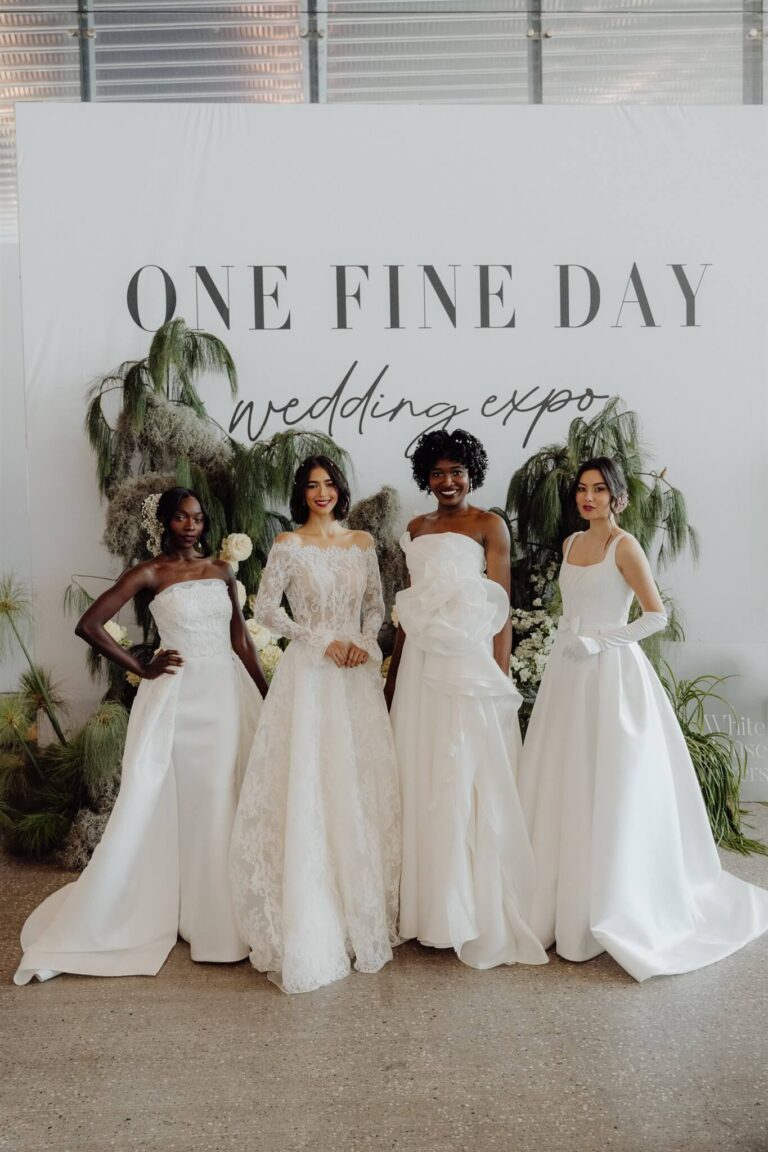 Full body shot view of five smiling models laughing together at the wedding expo in Sydney 2025