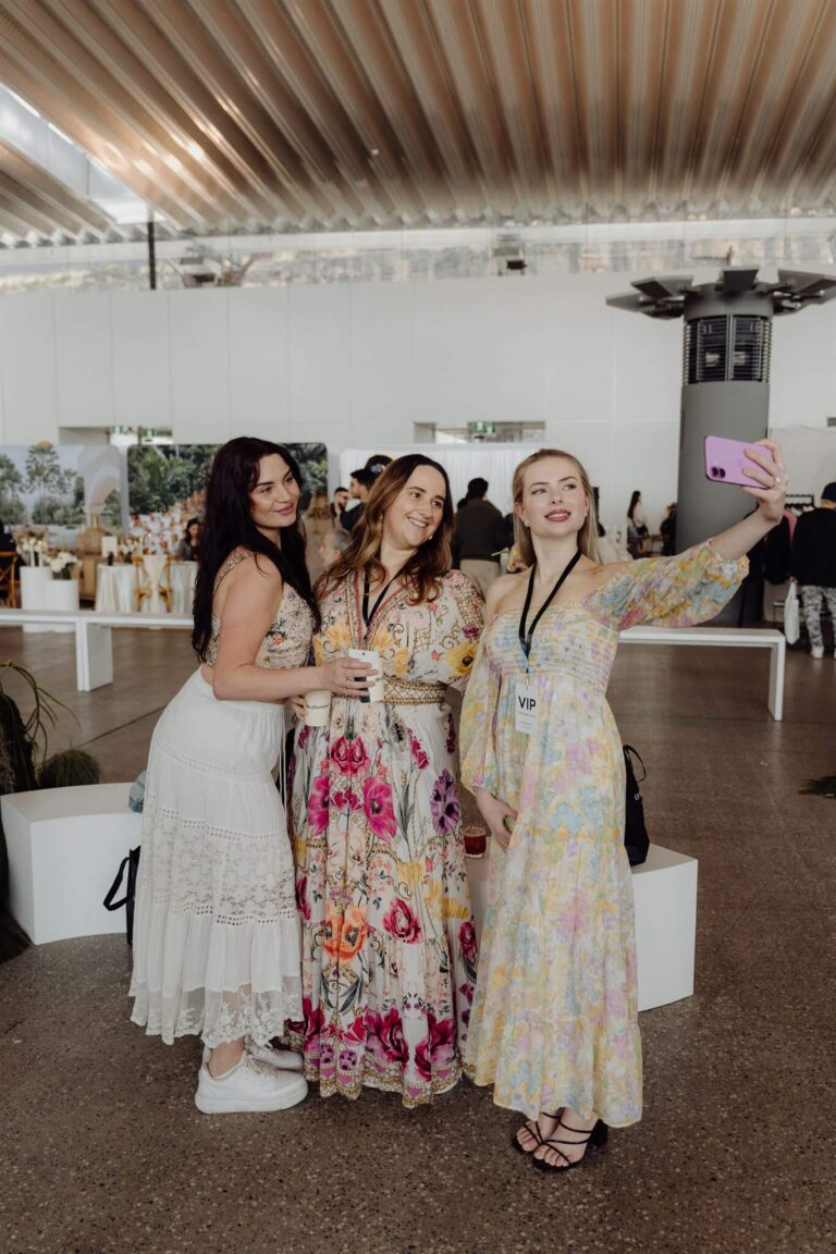 Exhibitors enjoying selfie together at wedding expo in Sydney 2025