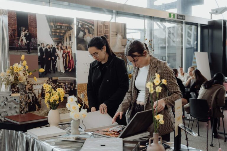 Wedding exhibitors reading materials at wedding expo in Sydney 2025