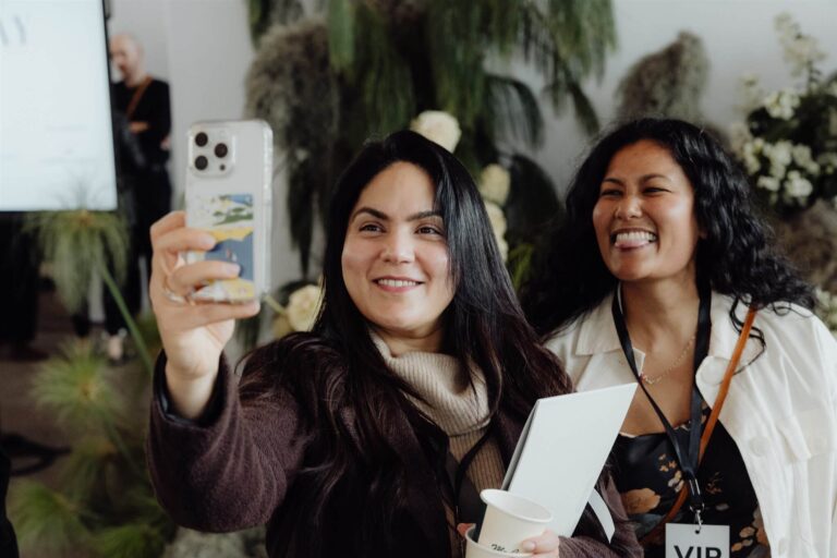Two exhibitors taking selfie at wedding expo in Sydney 2025
