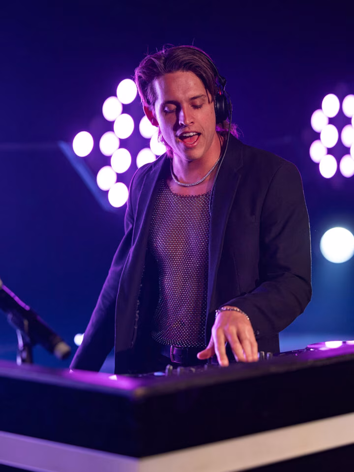 Vibrant wedding DJ hire experience by Kyle Maguire – lighting up the reception with non-stop music and crowd energy.