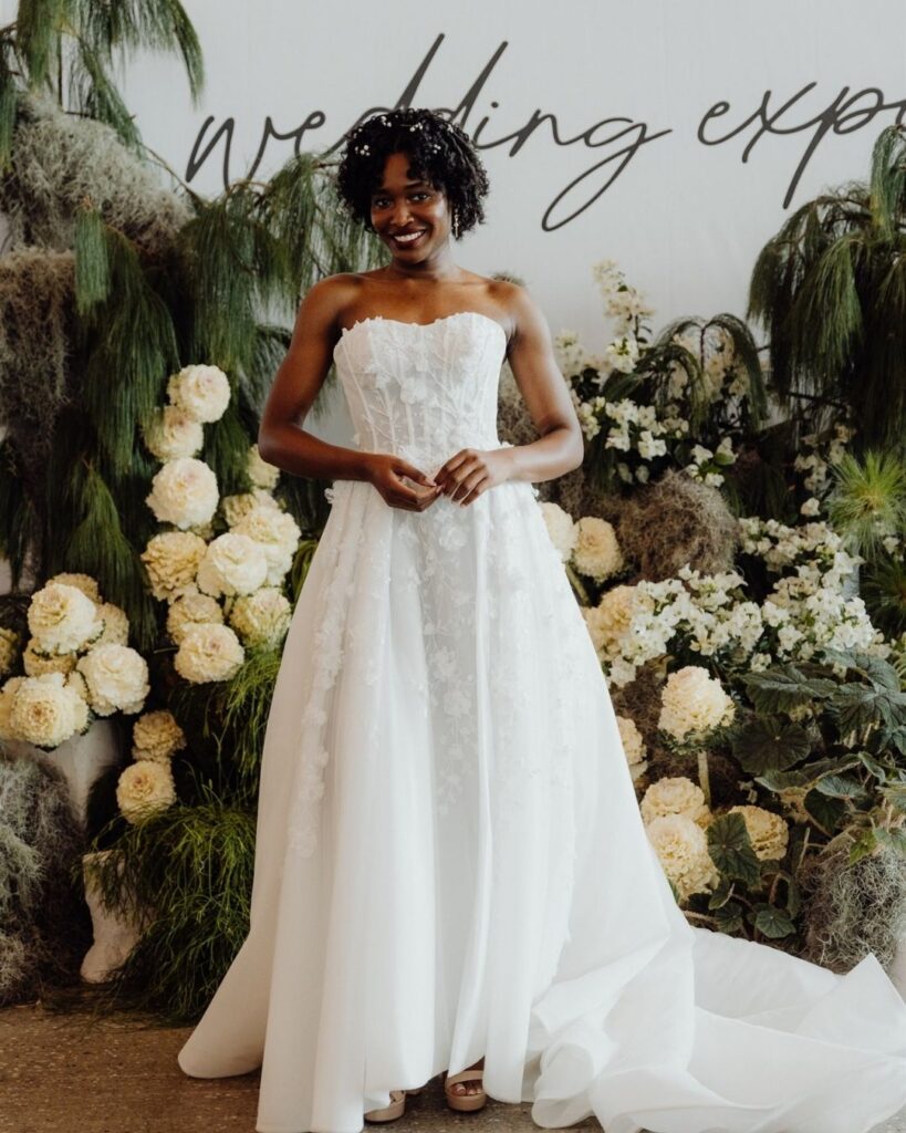 Detailed view of tube-style lace bridal gown during bridal runway show in Sydney 2025
